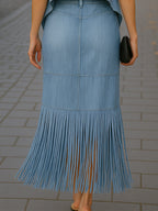 Stylish Denim Two-Piece Set With Asymmetrical Top And Fringed Skirt