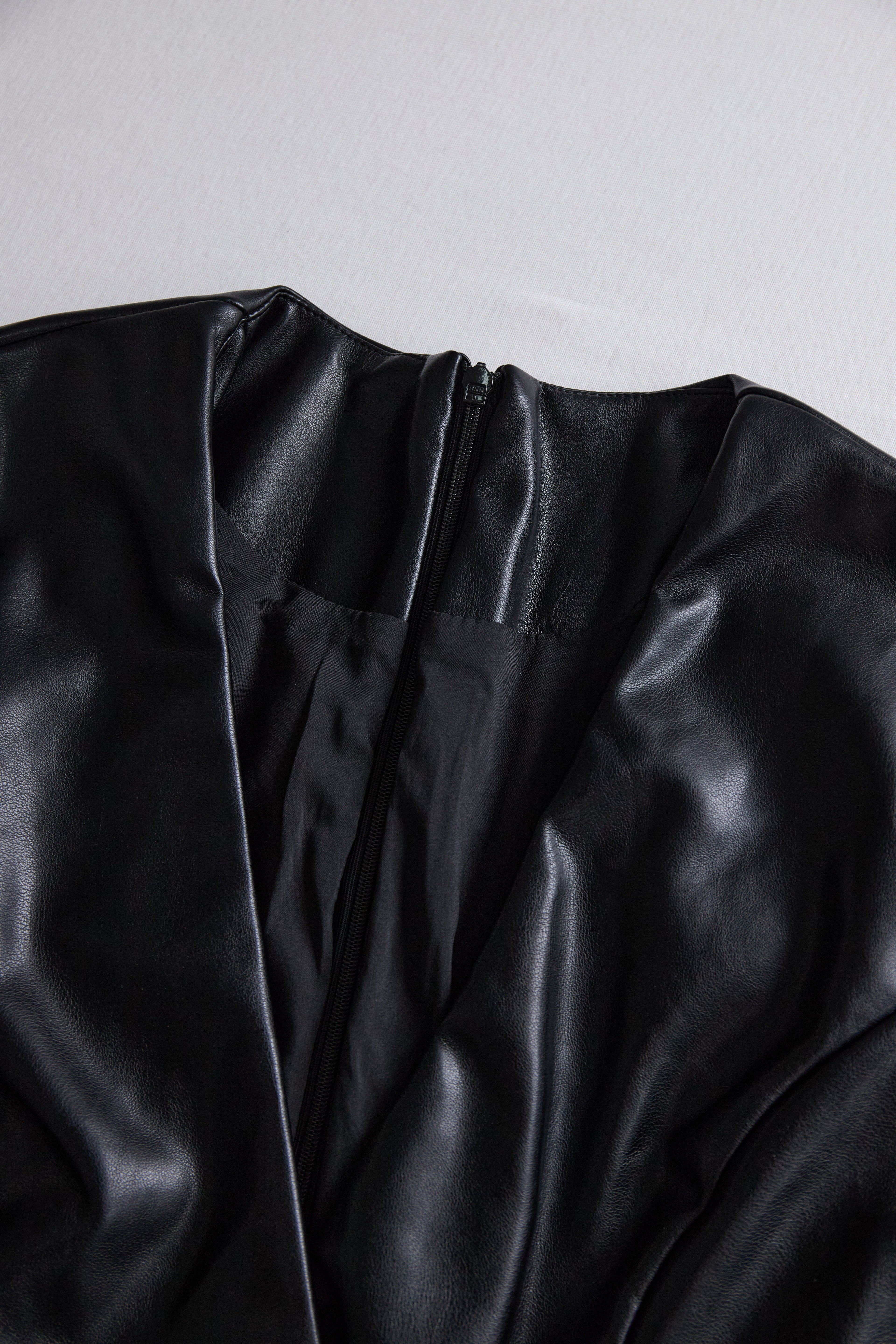 Sleek Black Faux Leather Wrap Mini Dress