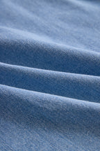 Stylish Denim Two-Piece Set With Asymmetrical Top And Fringed Skirt