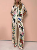 Elegant Satin Shirt & Trousers Set with Unique Modern Print