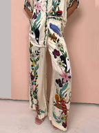 Elegant Satin Shirt & Trousers Set with Unique Modern Print