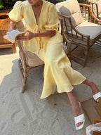 Elegant Yellow Linen Suit: V-Neck Mid-Sleeve Top & High-Waist Skirt