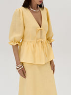 Elegant Yellow Linen Suit: V-Neck Mid-Sleeve Top & High-Waist Skirt