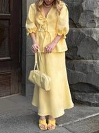 Elegant Yellow Linen Suit: V-Neck Mid-Sleeve Top & High-Waist Skirt