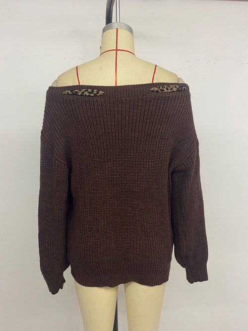 A long-sleeved sweater with a three-dimensional bow top